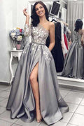 Robe de bal asymétrique manches longues gris satin fendue avec poches PG752