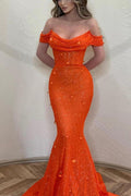 Abito da sera lungo sirena color arancio con spalle scoperte e paillettes