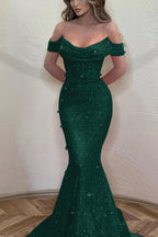 Vestido de noite comprido verde-escuro, estilo sereia, ombro à mostra, com lantejoulas