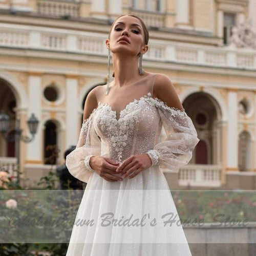 Robe de mariée Princesse Boho NumberSea avec manches bouffantes style plage