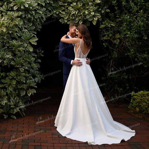 NumberSea Schlichtes A-Linien-Brautkleid aus weichem Satin 2021 V-Ausschnitt Ärmellos Spitze Spaghettiträger Versteckter Rock Taschen Rückenfreies Brautkleid