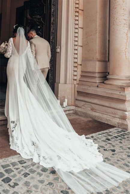 Romantisches rückenfreies Brautkleid mit langen Ärmeln in Meerjungfrauenform