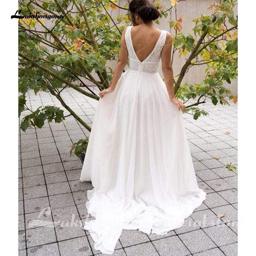 NumberSea Robes de mariée romantiques de plage en dentelle décolleté plongeant