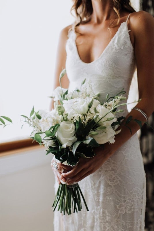 Romantisches Boho-Tiefauschnitt-Rückenfreies Spitzen-Schönes Meerjungfrau-Elegantes Hochzeitskleid