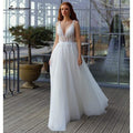 Robe de mariée féerique en tulle NumberSea avec décolleté plongeant sexy et dos ouvert