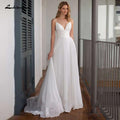 Robe de mariée simple en mousseline de soie à bretelles spaghetti et col en V
