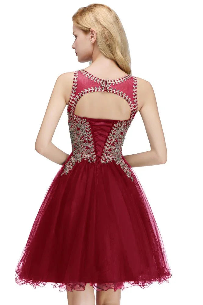 Ärmelloses A-Linien-Cocktailkleid mit funkelnden Perlen für den Homecoming-Ball