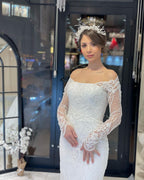 Trendiges bodenlanges Brautkleid mit langen Ärmeln und Meerjungfrau-Spitze