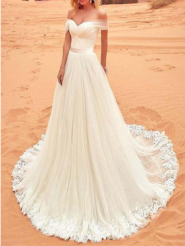 Robe de mariée en tulle ivoire asymétrique avec appliqués, WD0455