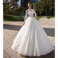 Robe de mariée NumberSea blanche à manches longues en ivoire
